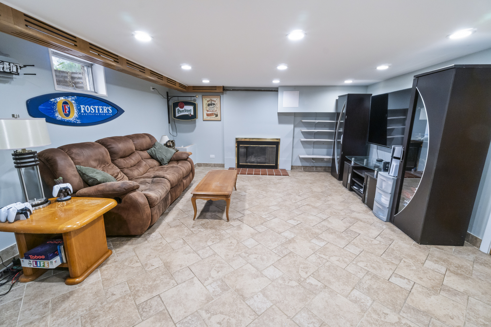 853 Orange Street Elgin, IL 60123 - Photo 14 of 28 a living room with furniture and a flat screen tv