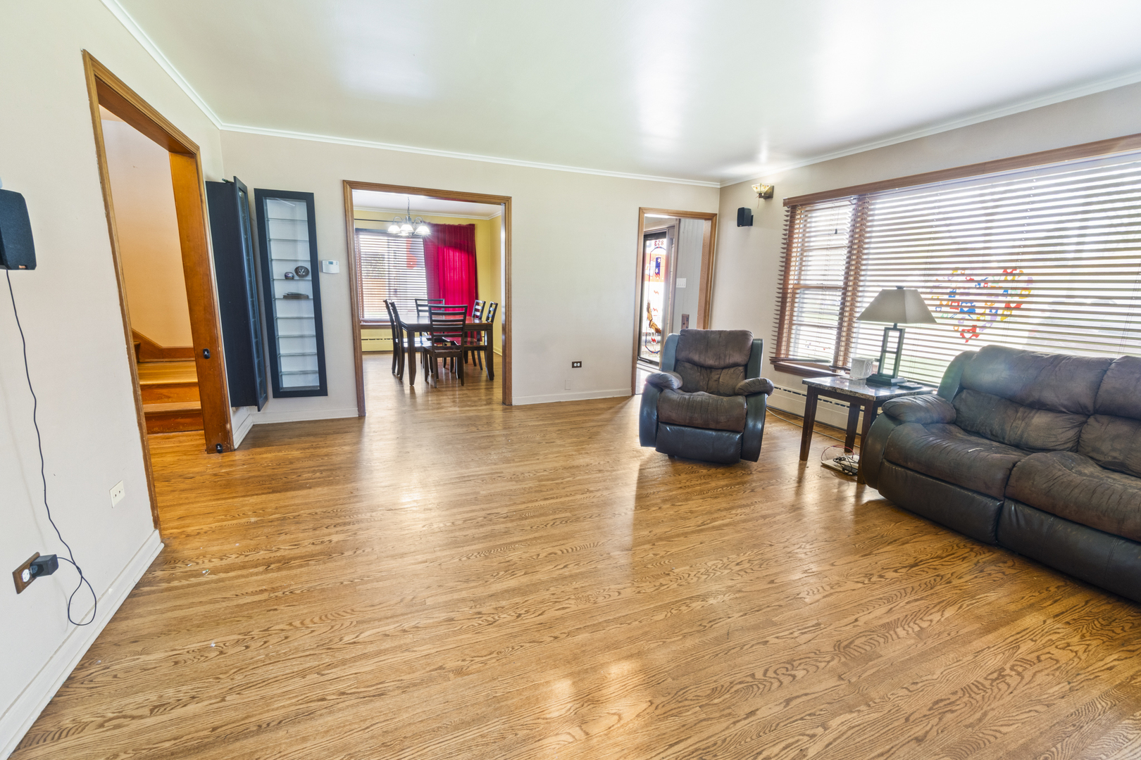 853 Orange Street Elgin, IL 60123 - Photo 3 of 28 a living room with furniture and a large window