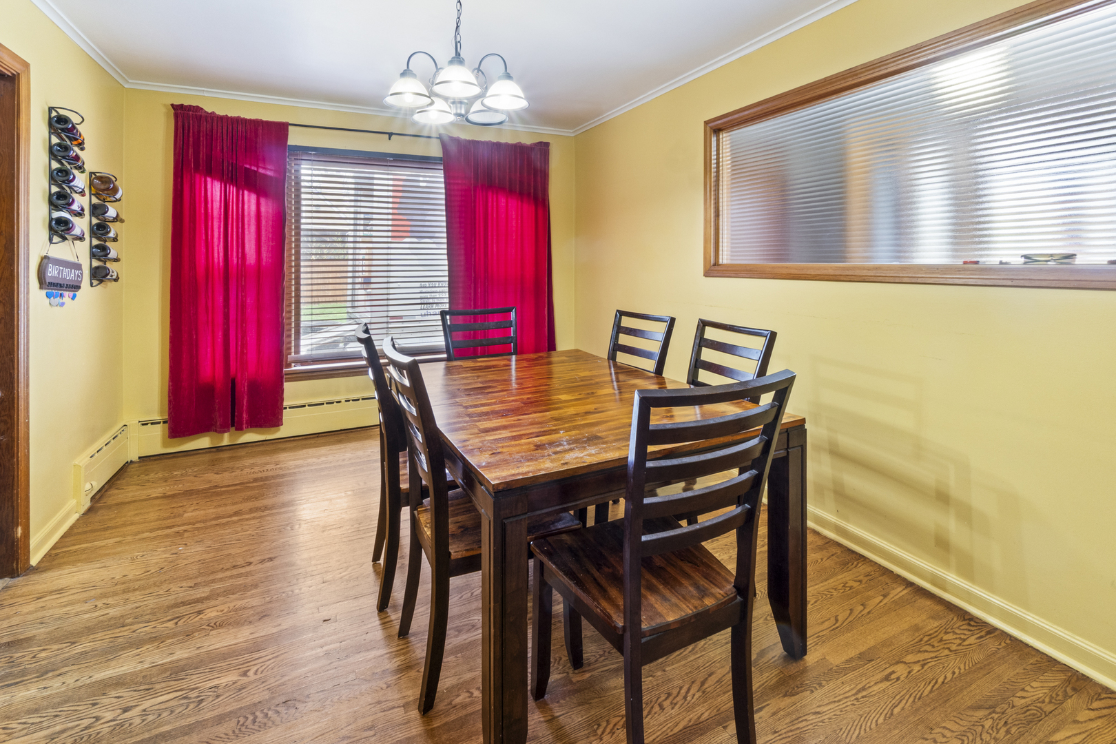 853 Orange Street Elgin, IL 60123 - Photo 5 of 28 a view of a dining room with furniture and window