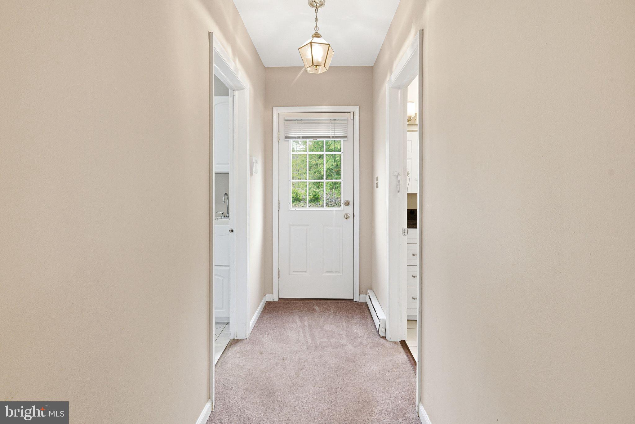 4053 Wedgewood Road Allentown, PA 18104 - Photo 17 of 34 Inviting hallway with natural light.