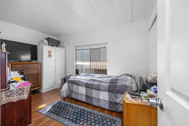 a view of a storage and utility room with washer and dryer