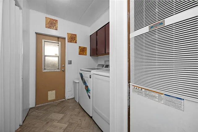 a bathroom with a sink a toilet and shower curtain