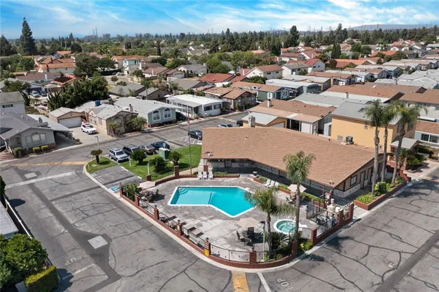 a view of a swimming pool with a lounge chair