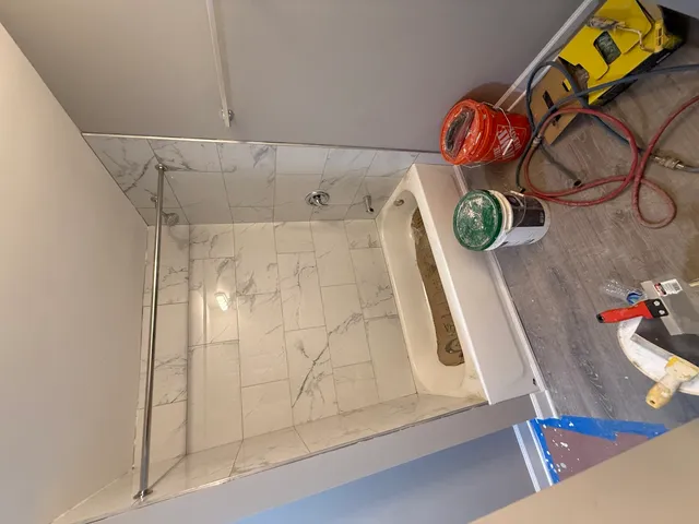 a view of staircase and utility room