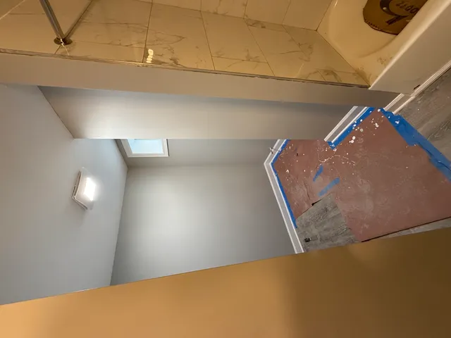 a view of walk in closet with window