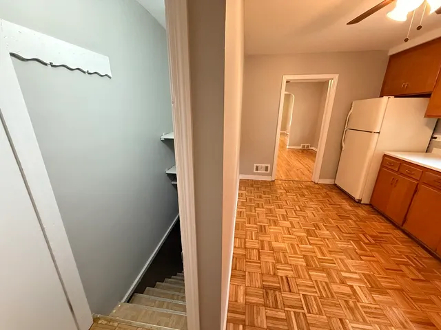a bathroom with a granite countertop shower and a sink
