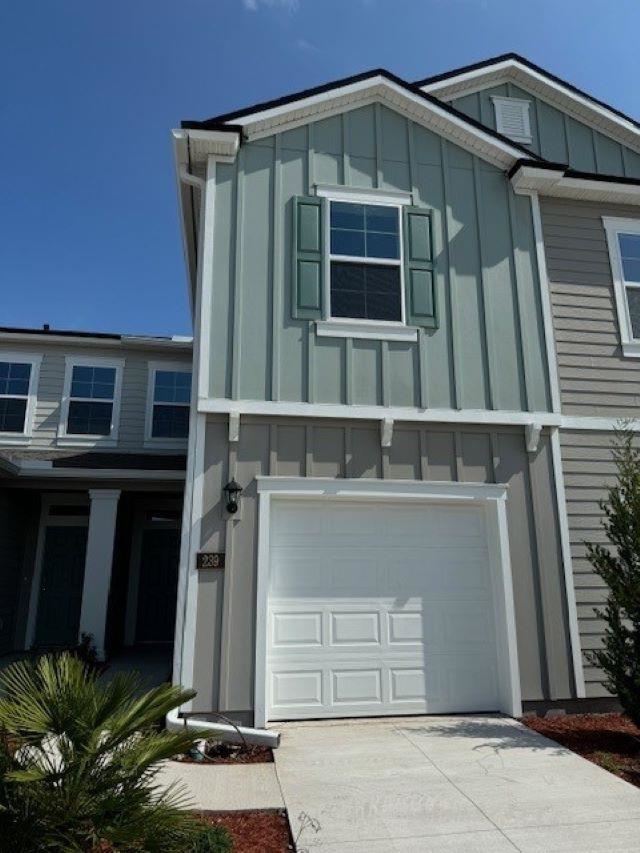 239 Redbud Road Palm Coast, FL 32137 - Photo 1 of 34 a front view of a house with a yard