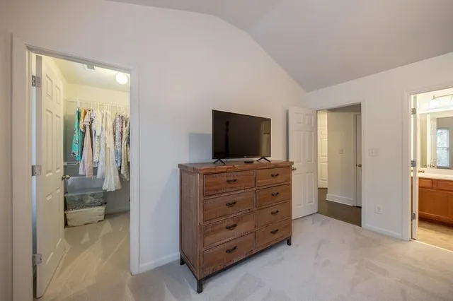a view of a livingroom with workspace and a couch