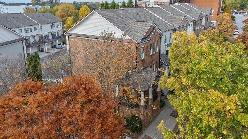 3908 Charleston Market Street Northwest Suwanee, GA 30024 - Photo 46 of 58 a view of a house with a tree and plants
