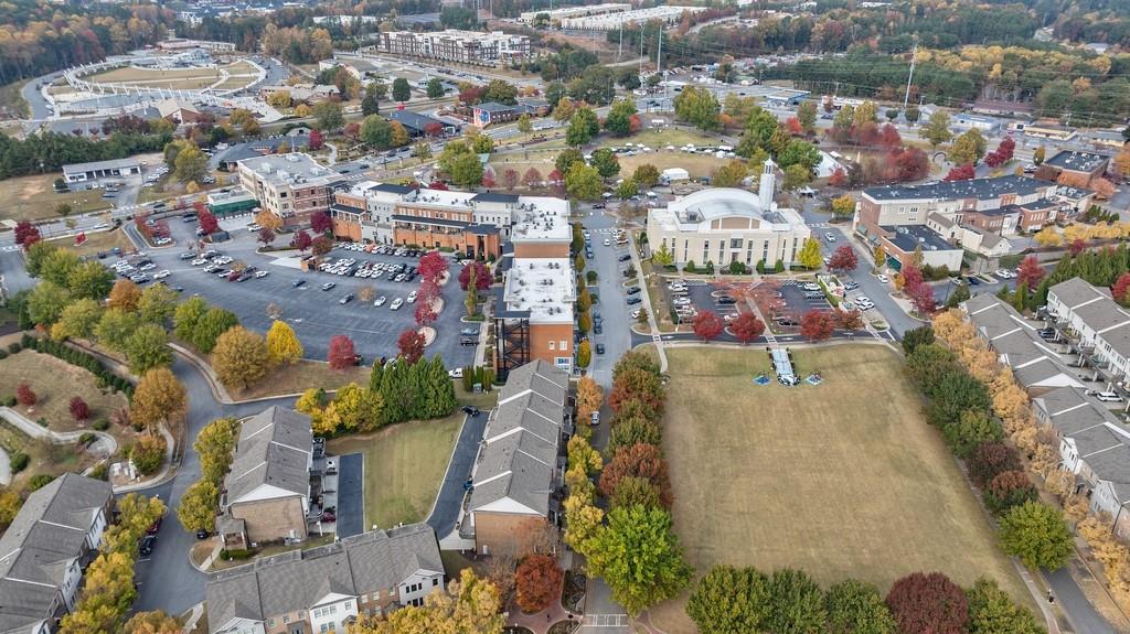 3908 Charleston Market Street Northwest Suwanee, GA 30024 - Photo 47 of 58 an aerial view of residential houses with outdoor space