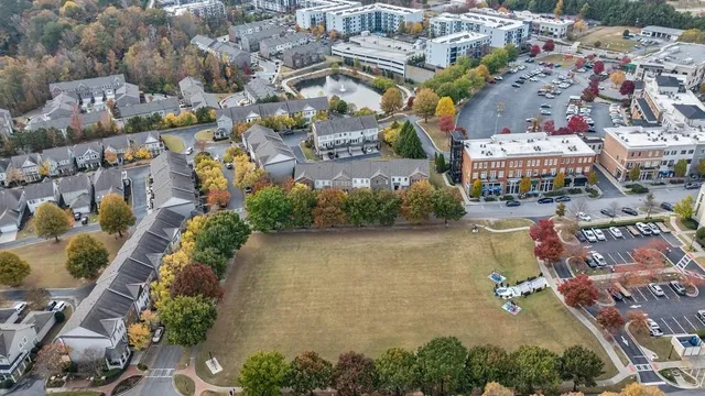a view of a patio with a table and chairs