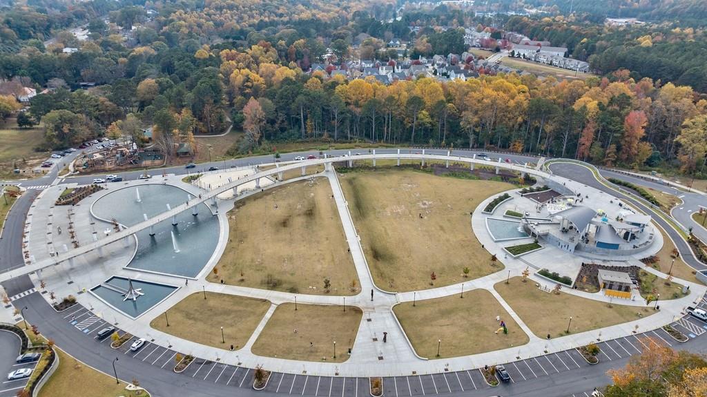3908 Charleston Market Street Northwest Suwanee, GA 30024 - Photo 53 of 58 an aerial view of a swimming pool with outdoor seating