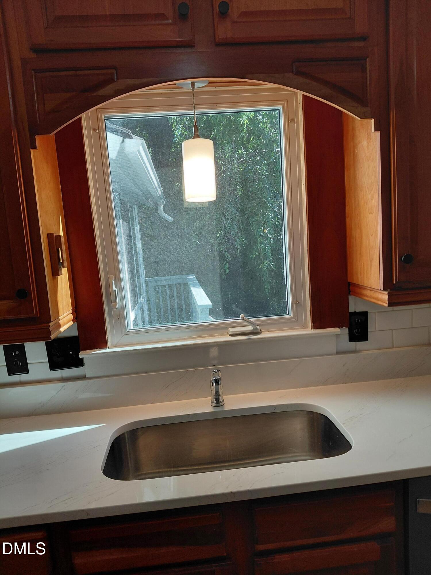 804 Olive Street Apex, NC 27502 - Photo 19 of 60 a close view of sink and tap