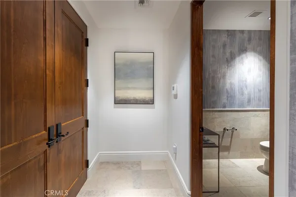 a living room with lots of furniture and a flat screen tv