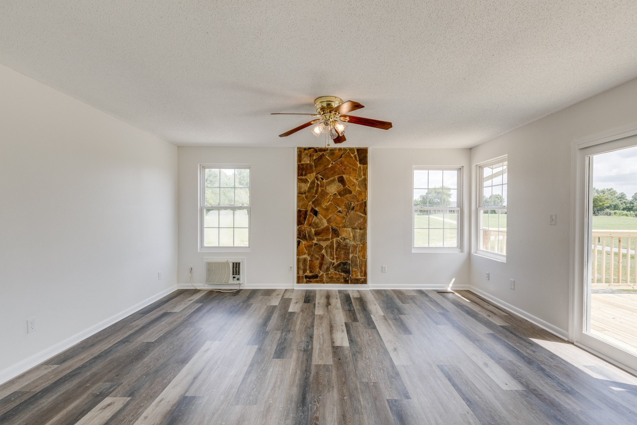 6665 Beasleys Bend Road Lebanon, TN 37087 - Photo 23 of 33 wooden floor in an empty room with a window