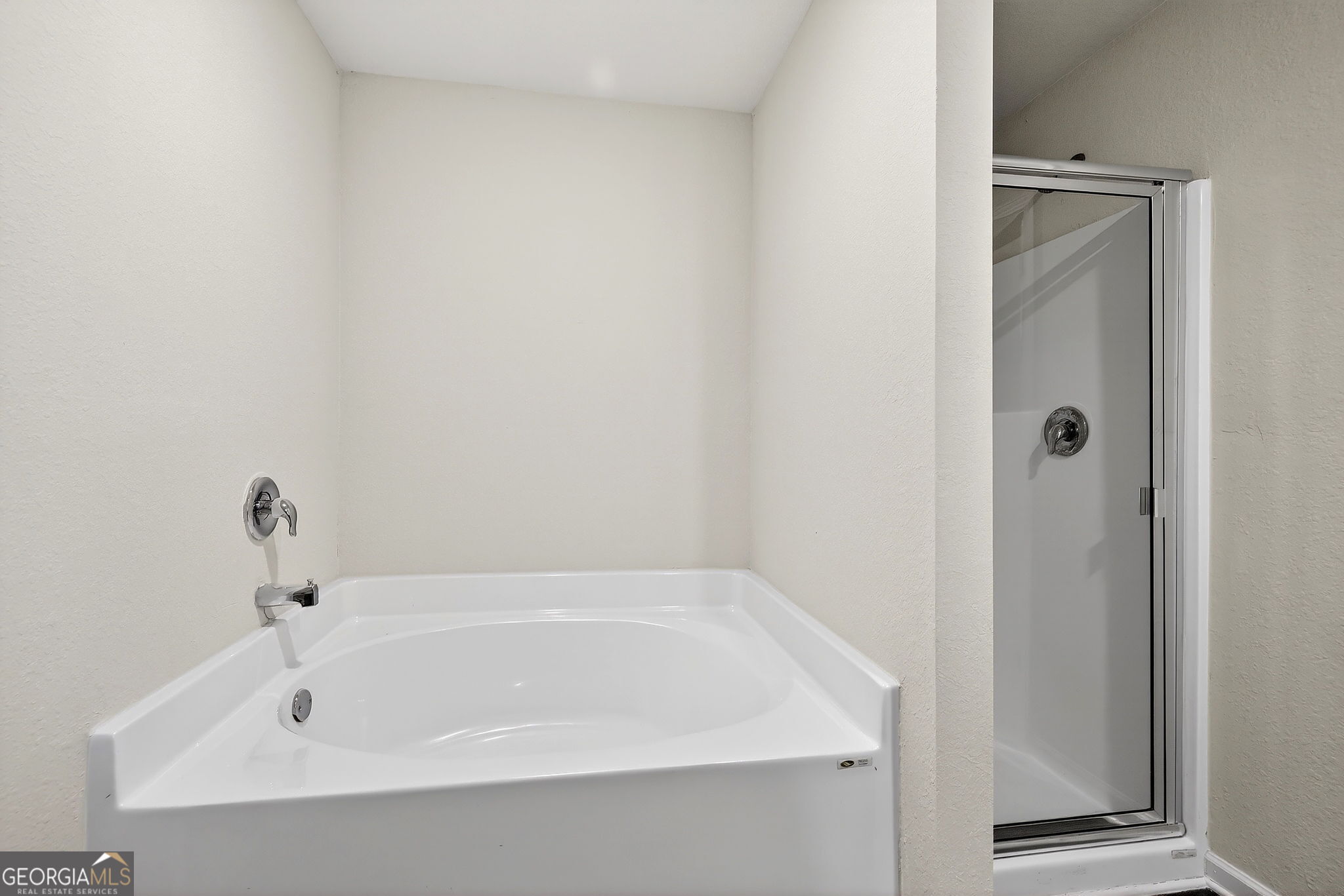 805 Golden Bell Way Villa Rica, GA 30180 - Photo 21 of 51 a white bath tub sitting next to a white sink