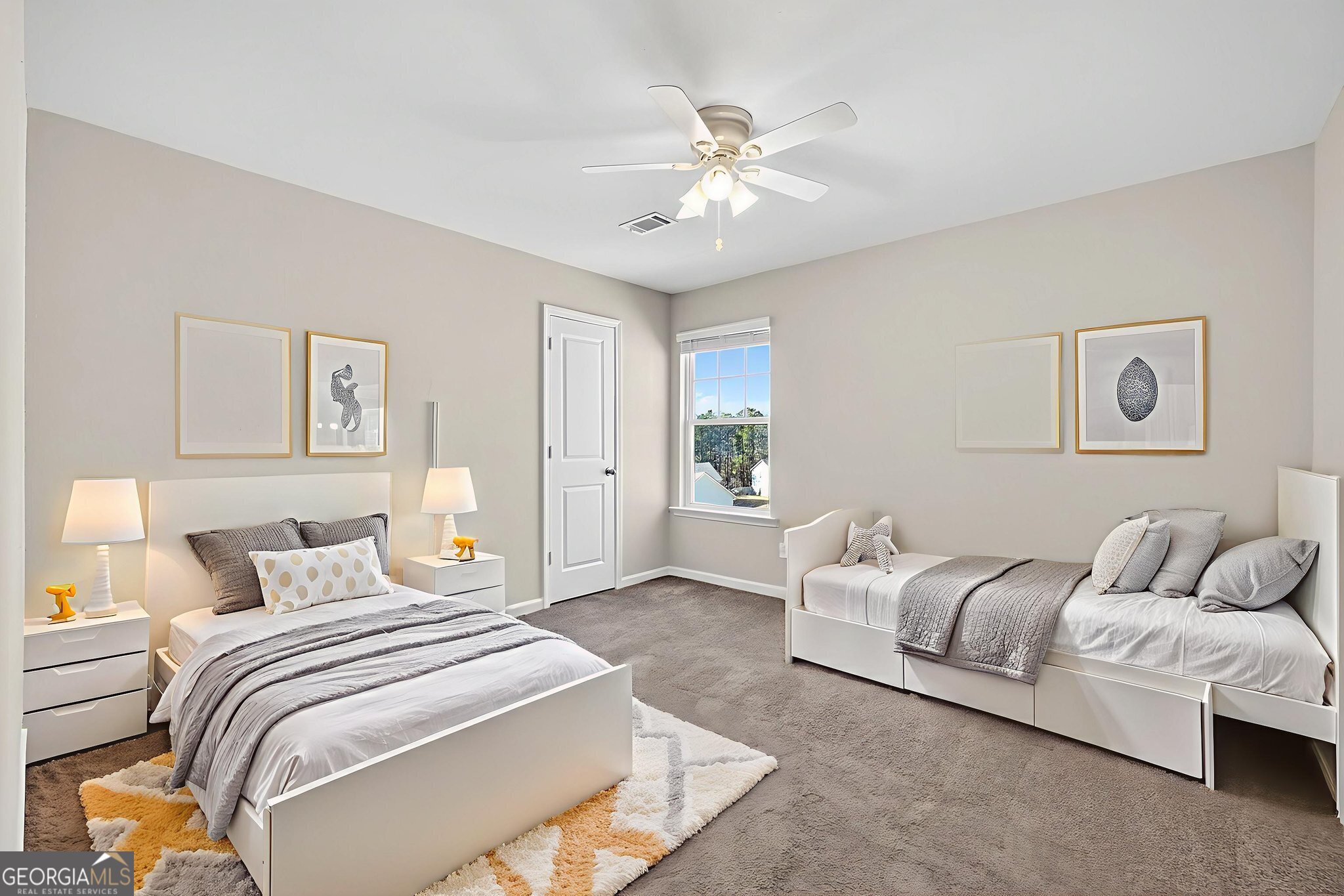 805 Golden Bell Way Villa Rica, GA 30180 - Photo 23 of 51 a spacious bedroom with a bed and ceiling fan