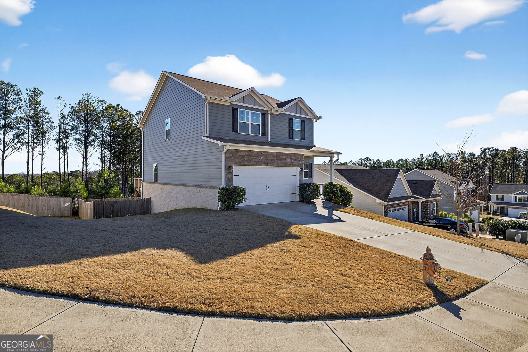805 Golden Bell Way Villa Rica, GA 30180 - Photo 3 of 51 a front view of a house with entertaining space