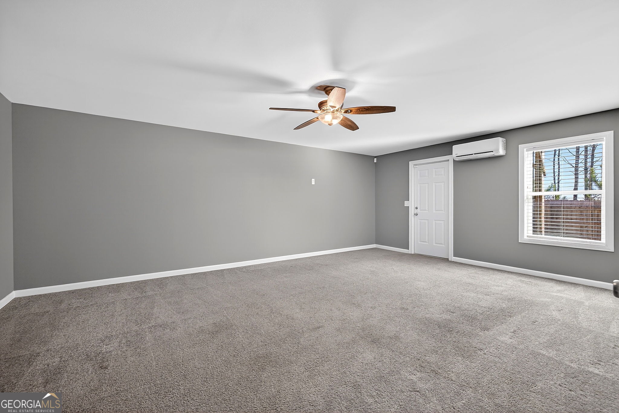 805 Golden Bell Way Villa Rica, GA 30180 - Photo 35 of 51 a view of an empty room with a window
