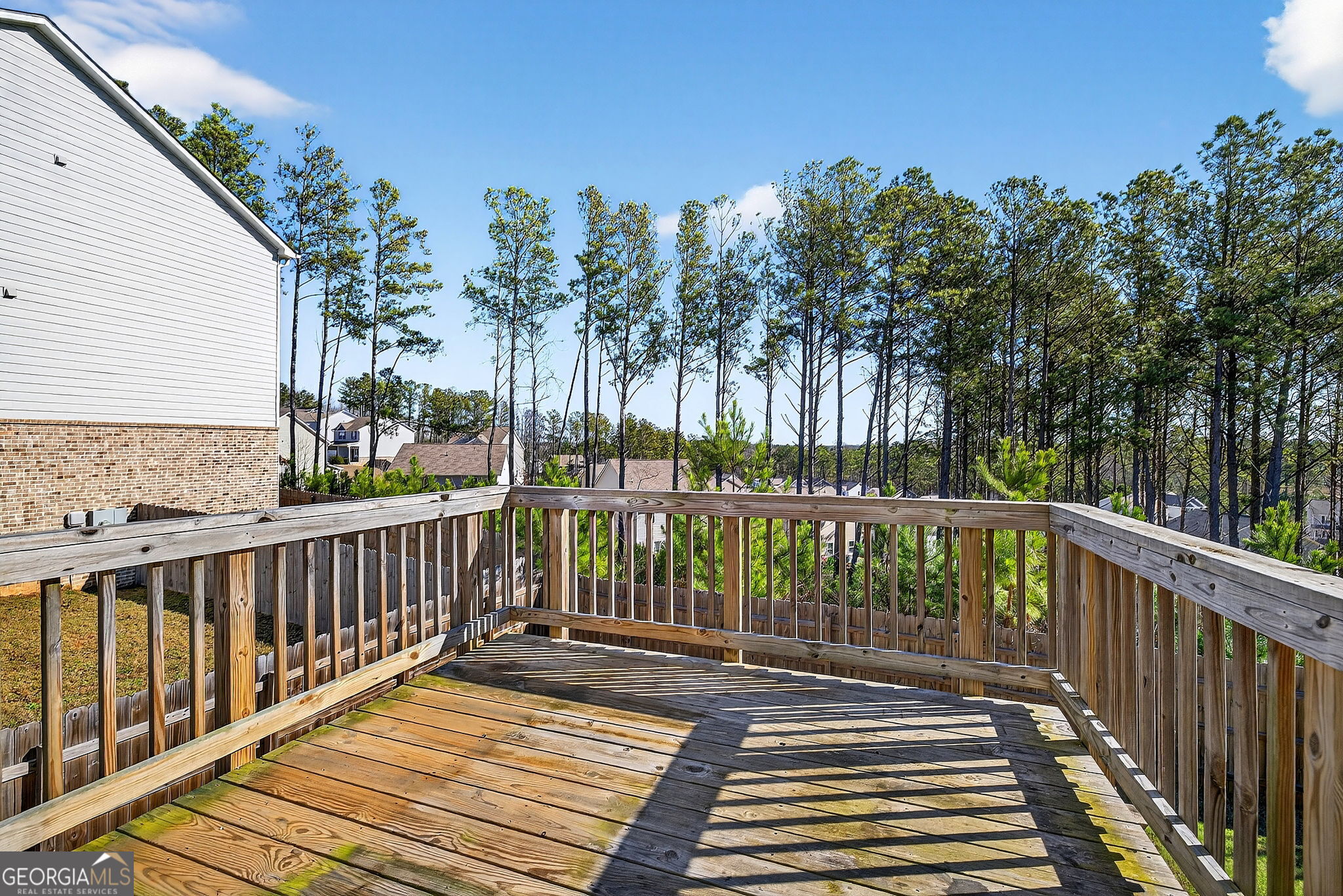 805 Golden Bell Way Villa Rica, GA 30180 - Photo 39 of 51 a view of balcony with wooden floor and fence