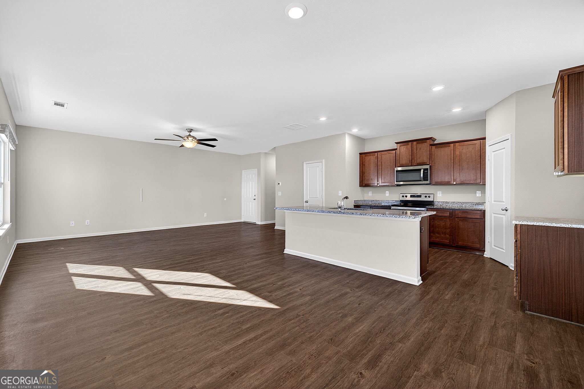 805 Golden Bell Way Villa Rica, GA 30180 - Photo 10 of 51 a view of kitchen with microwave and cabinets