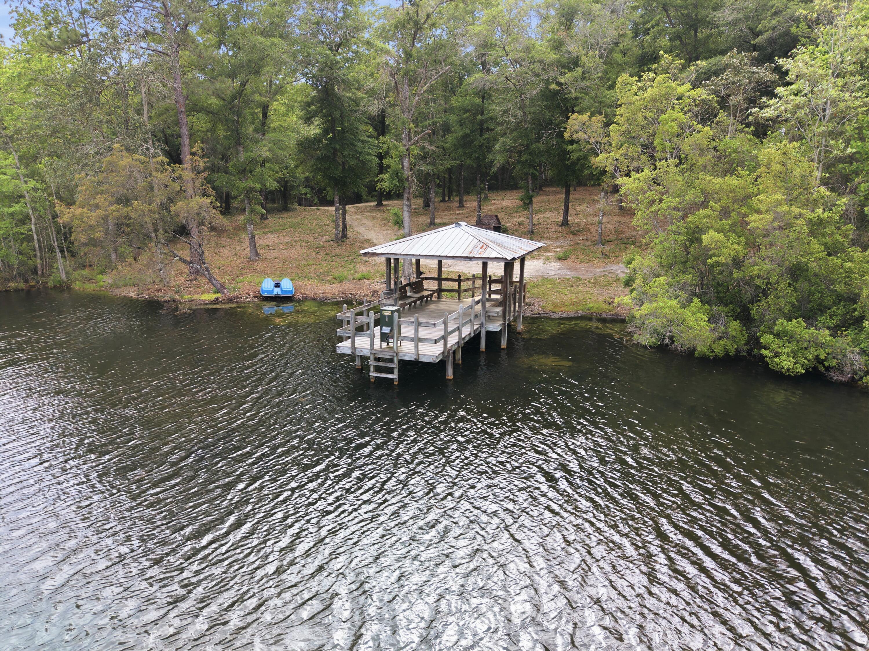 261 Wilkerson Road DeFuniak Springs, FL 32433 - Photo 9 of 76 Dock on the 5 acre pond