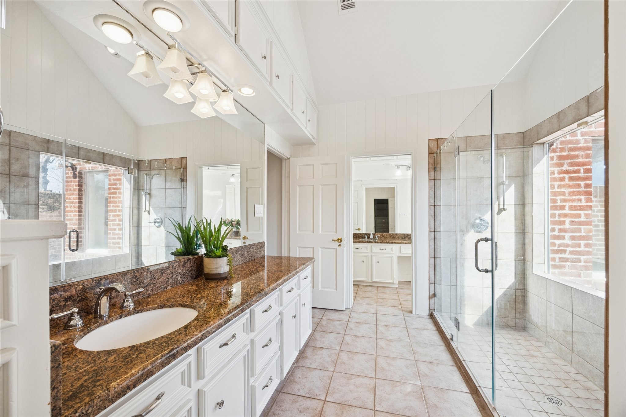 6611 Riva Ridge Drive Richmond, TX 77406 - Photo 26 of 46 The primary bath features a his and hers layout with ample space and natural light.