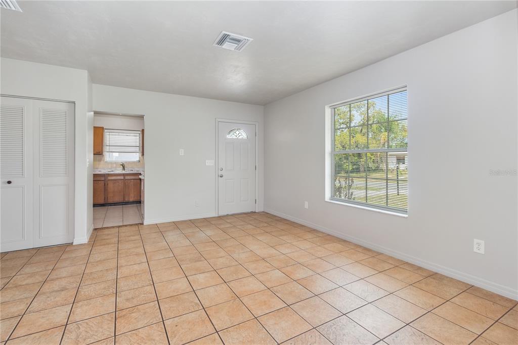 7208 Fair Oaks Street Spring Hill, FL 34606 - Photo 11 of 25 a view of an empty room and window