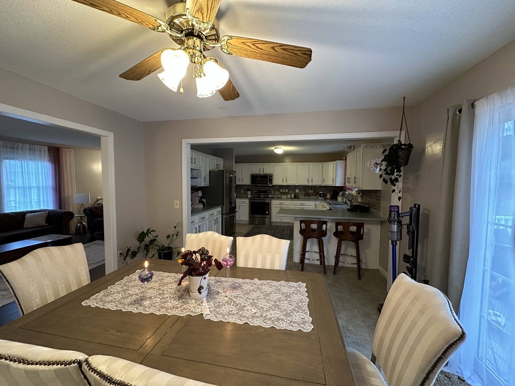 68 Lariviere Drive Chicopee, MA 01020 - Photo 12 of 42 a living room with furniture and kitchen view