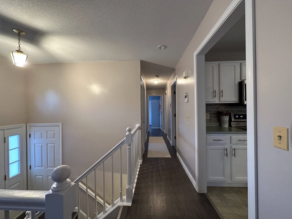 68 Lariviere Drive Chicopee, MA 01020 - Photo 18 of 42 a view of hallway with stairs