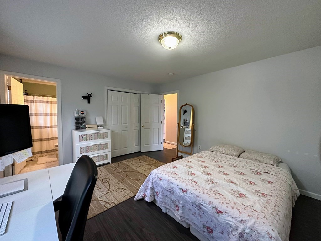 68 Lariviere Drive Chicopee, MA 01020 - Photo 25 of 42 a bedroom with a bed and a flat screen tv