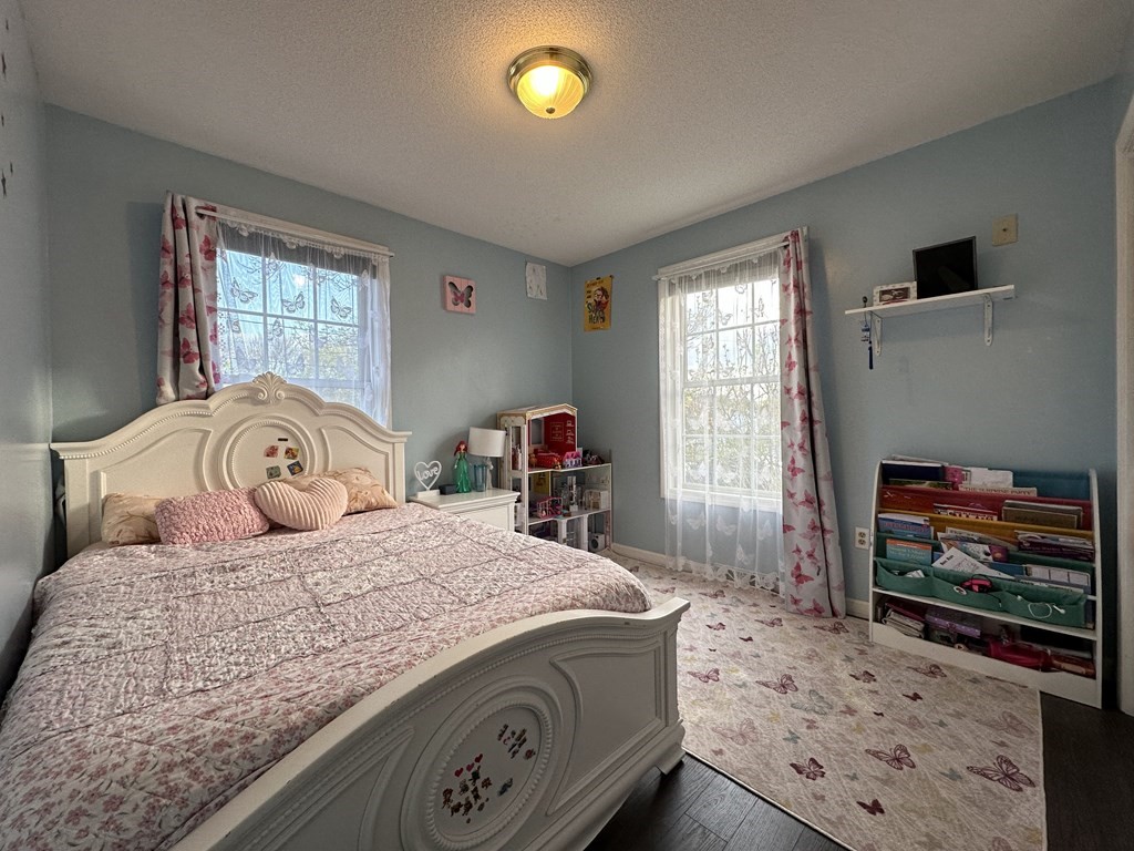 68 Lariviere Drive Chicopee, MA 01020 - Photo 27 of 42 a bedroom with a bed and a window