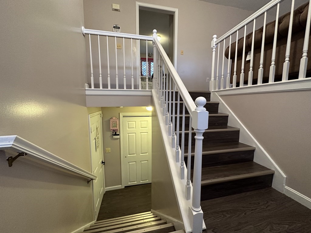68 Lariviere Drive Chicopee, MA 01020 - Photo 29 of 42 a view of staircase with wooden floor and a rug