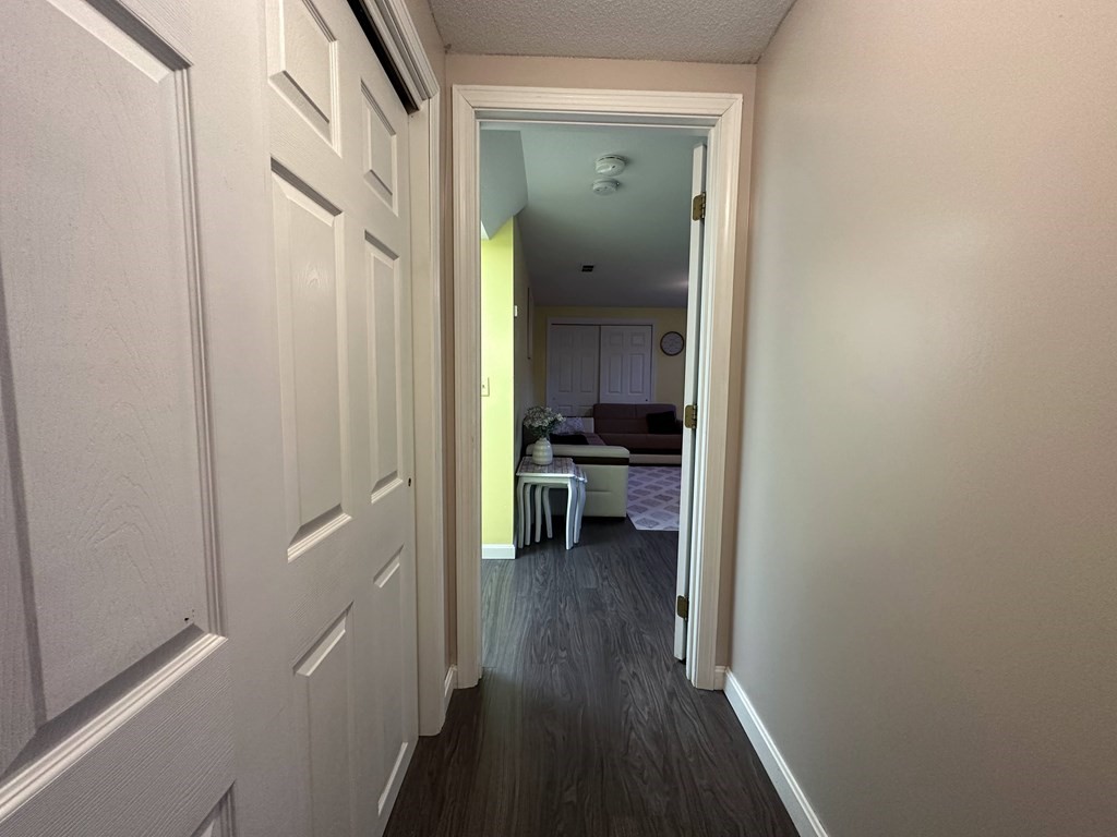68 Lariviere Drive Chicopee, MA 01020 - Photo 30 of 42 a view of a hallway with a hardwood floor and a hallway