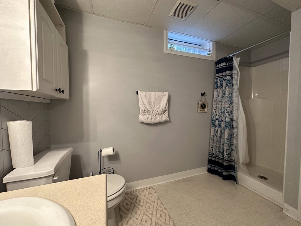 68 Lariviere Drive Chicopee, MA 01020 - Photo 36 of 42 a bathroom with a toilet a sink and a shower