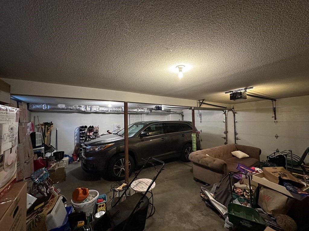 68 Lariviere Drive Chicopee, MA 01020 - Photo 41 of 42 a view of a room with gym equipment