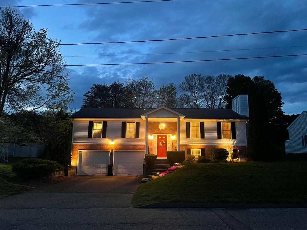 68 Lariviere Drive Chicopee, MA 01020 - Photo 42 of 42 a front view of a house with a yard