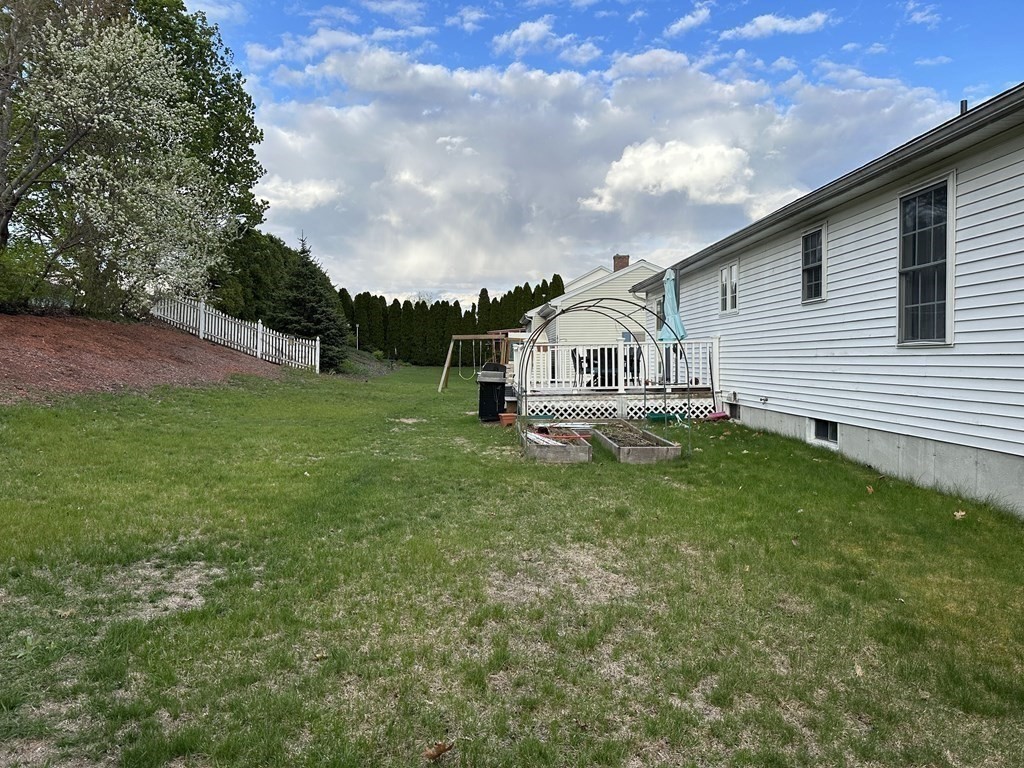 68 Lariviere Drive Chicopee, MA 01020 - Photo 6 of 42 a view of house with backyard and garden