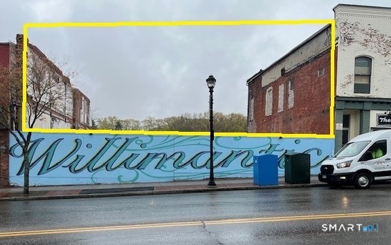 a sign that is on the side of a building