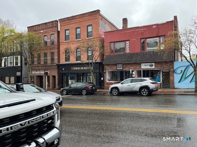 760 Main Street Windham, CT 06226 - Photo 3 of 6 a view of a cars park in front of a building