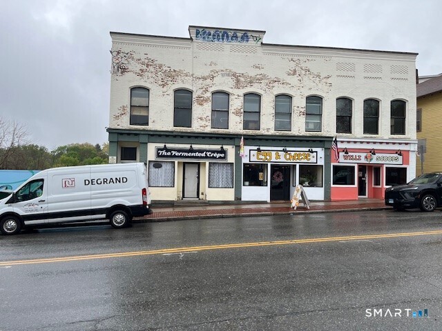 760 Main Street Windham, CT 06226 - Photo 4 of 6 a view of building with parking area