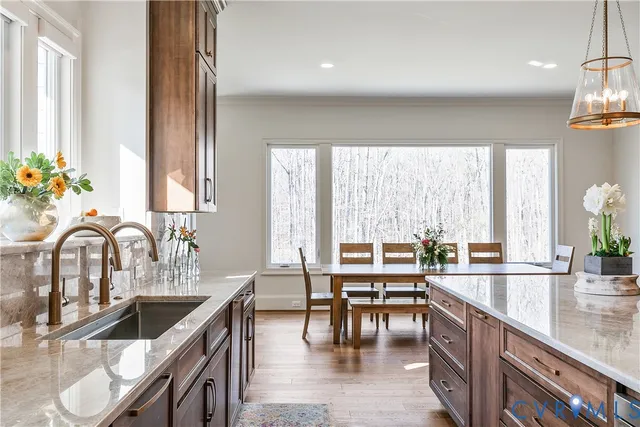 a spacious bedroom with a large bed and a window