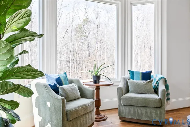 a spacious bathroom with a granite countertop sink and a mirror