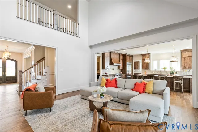 a kitchen with lots of wooden furniture appliances and furniture