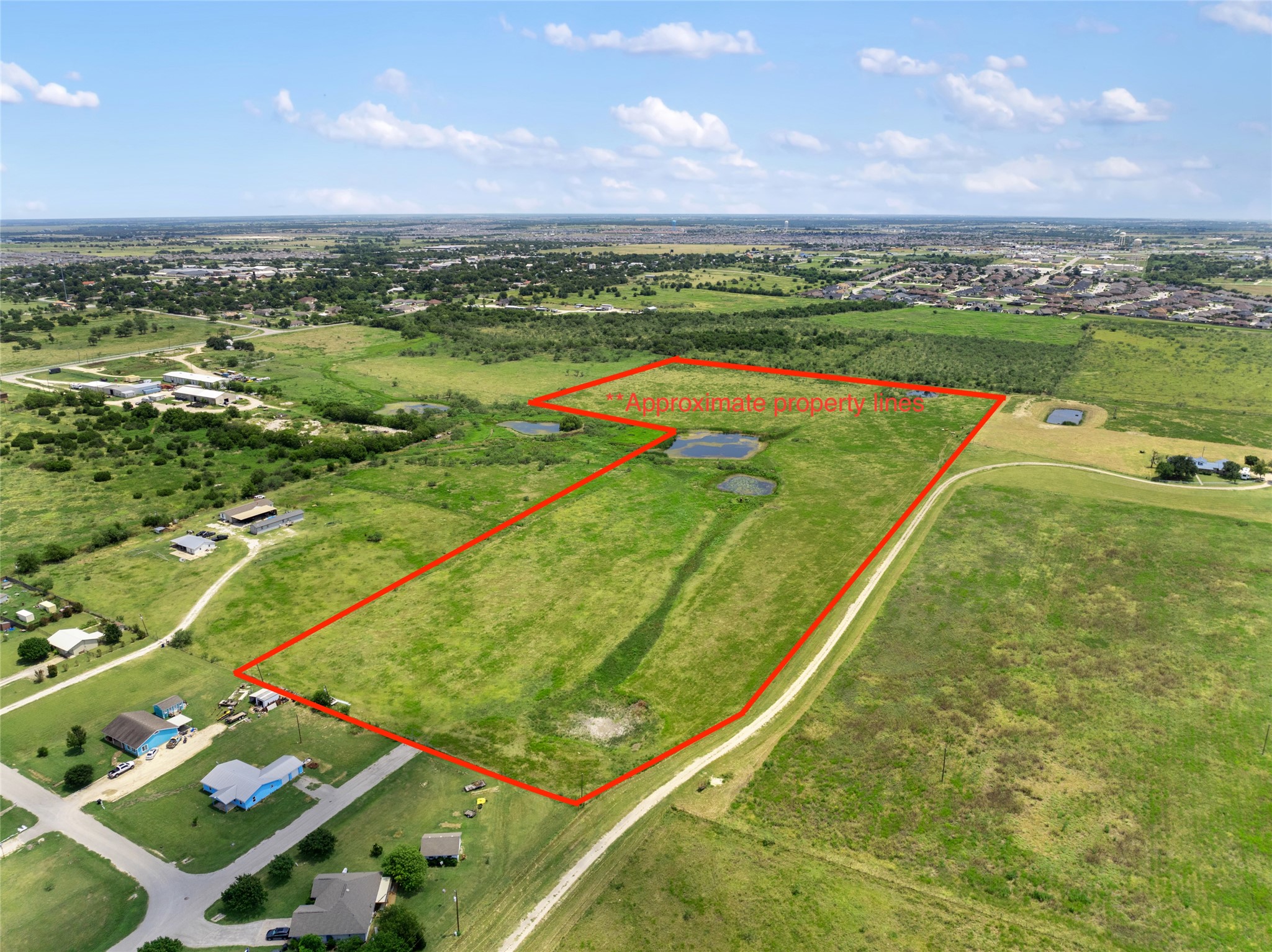 1775 County Road 305 Jarrell, TX 76537 - Photo 2 of 11 Overview of rural landscape with property boundaries highlighted