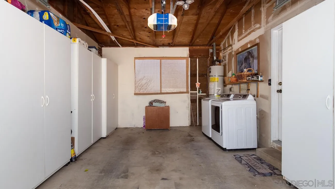 11739 Walnut Road Lakeside, CA 92040 - Photo 12 of 16 a view of a storage & utility room with washer and dryer