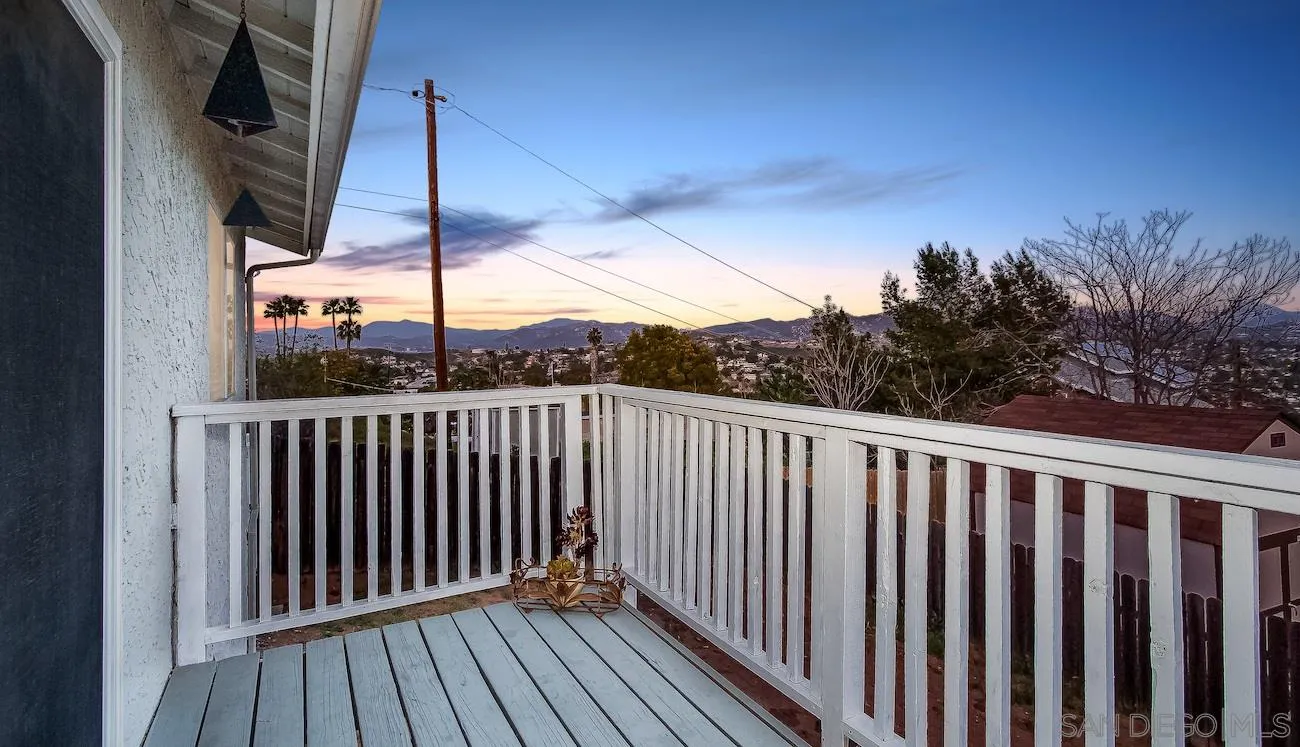 11739 Walnut Road Lakeside, CA 92040 - Photo 13 of 16 a view of balcony with wooden floor and fence