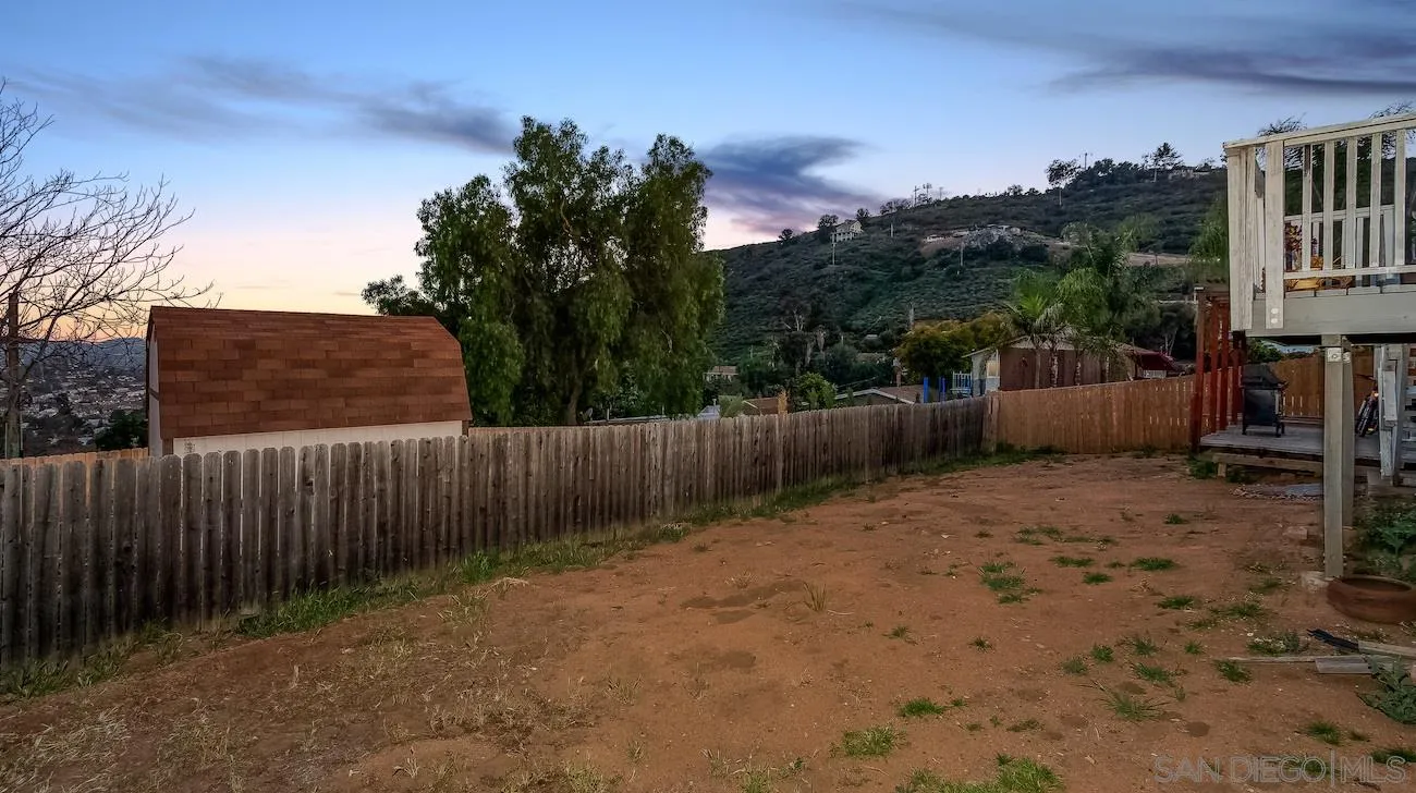 11739 Walnut Road Lakeside, CA 92040 - Photo 15 of 16 a backyard of a house with lots of green space