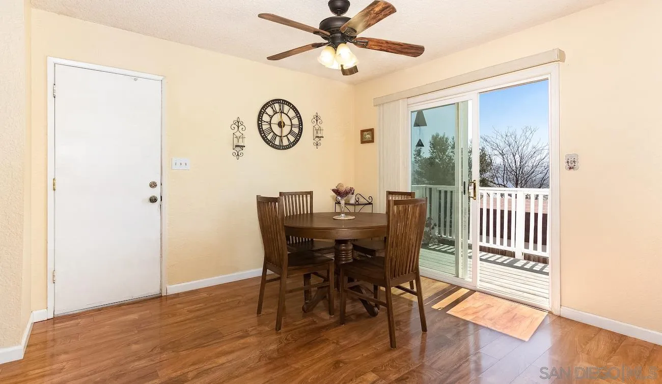 11739 Walnut Road Lakeside, CA 92040 - Photo 4 of 16 a view of a dining room with furniture window and wooden floor