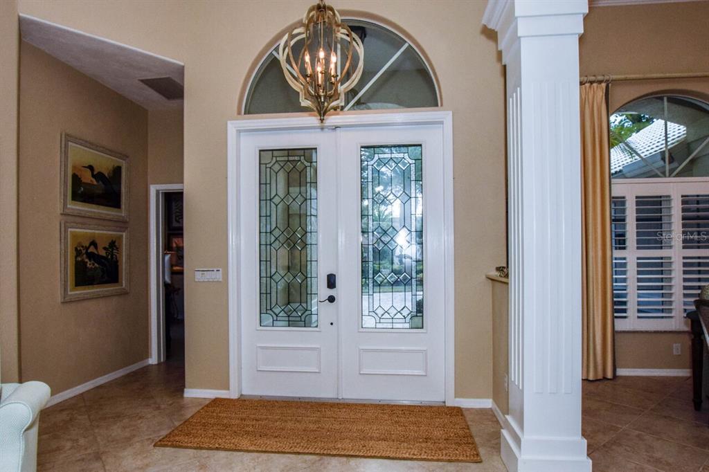 429 Tremingham Way Venice, FL 34293 - Photo 5 of 73 a view of entryway with a rug